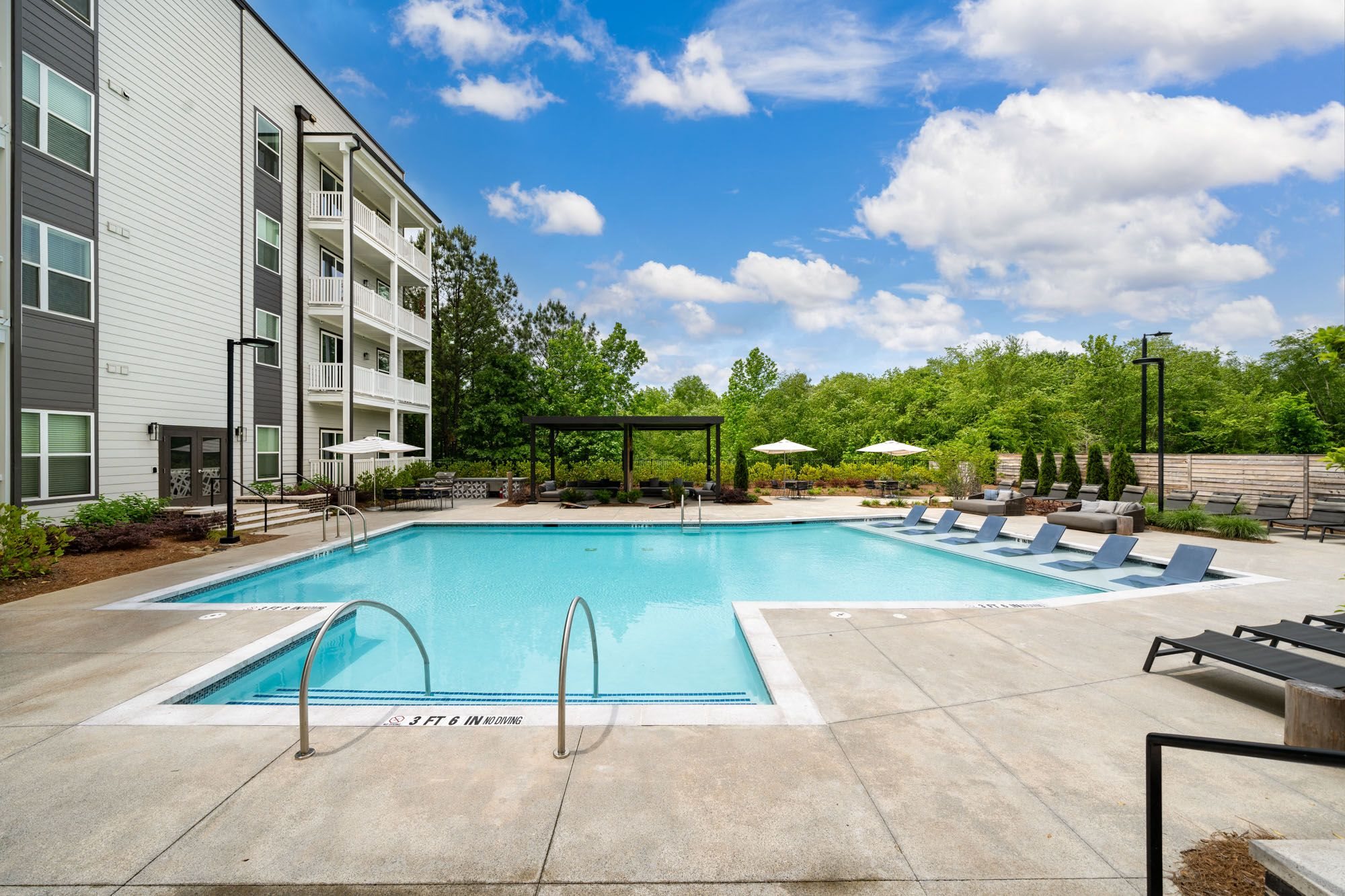 our apartments have a resort style pool with lounge chairs